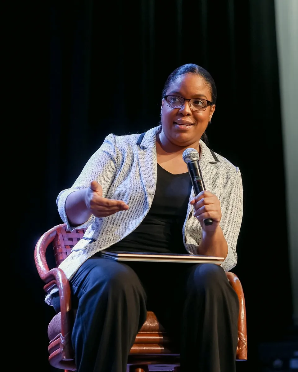 Kamilah Jones on stage at Summit 26