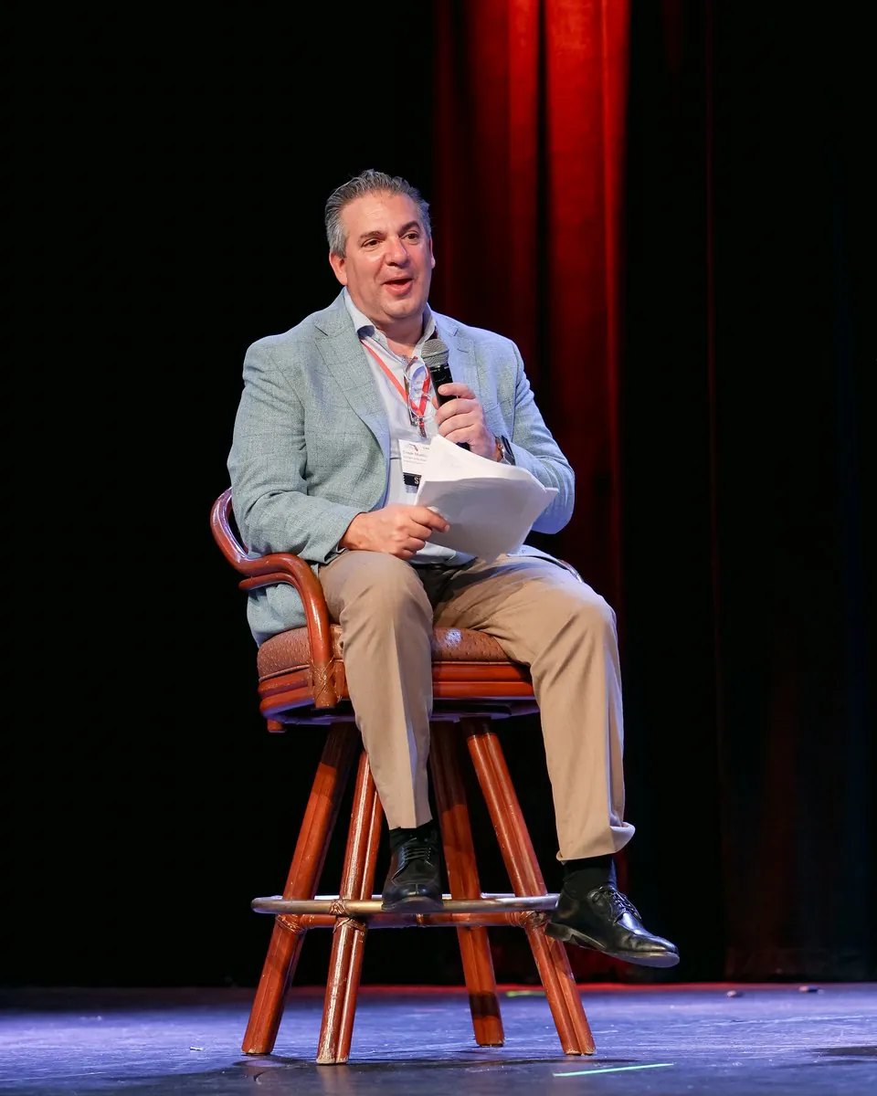 Cesar Murillo on stage at Summit 26
